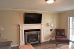Basement TV and fireplace 